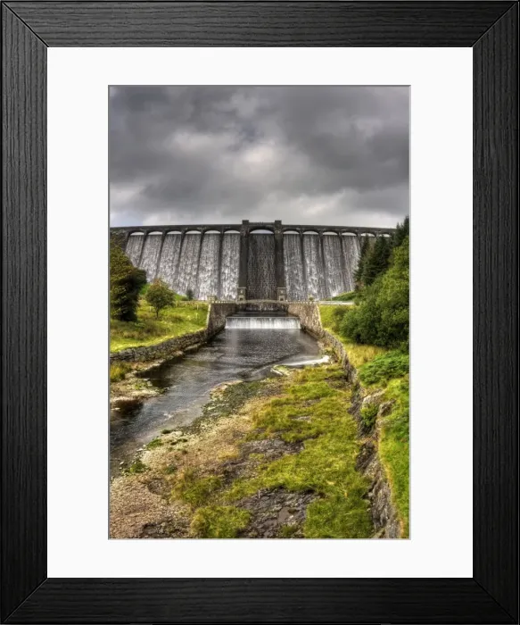 Framed Print : Claerwen Dam, Elan Valley, overflowing after heavy rainfall Framed Print : Claerwen Dam, Elan Valley, overflowing after heavy rainfall