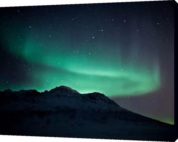 Northern Lights above a mountain