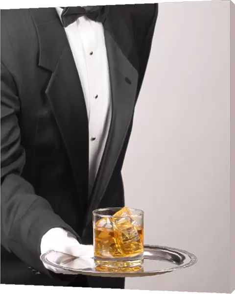 Butler holding Cocktail on tray