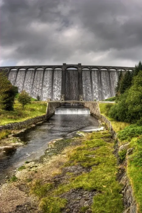 Framed Print : Claerwen Dam, Elan Valley, overflowing after heavy rainfall Framed Print : Claerwen Dam, Elan Valley, overflowing after heavy rainfall