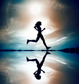 Outdoor Gallery: Runner Silhouetted Reflection