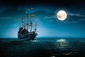 Water Collection: Sailing ship on the high seas in the night. Flying Dutchman by the Moon light